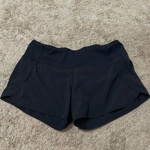 Black lulu track short 4in size 6
